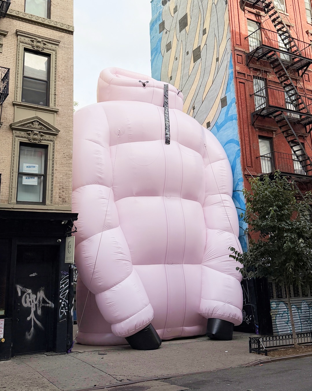 Inflatable brand activation: a giant Aritzia Super Puff jacket on Ludlow Street, New York