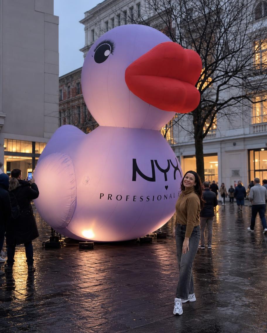 AI-generated visual of the NYX duck lit at dusk on a wet street